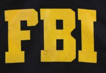 FBI Freezes Terrorist Crypto — Huge Details FBI logo displayed in large yellow letters on a black background