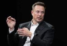 Musk Cheers Populist Surge — Leftists Fume Elon Musk in a suit talking.