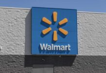 E. Coli Warning Hits Walmart Walmart store sign on exterior wall
