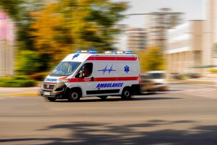 Novi,Sad,,Rs,-,Sep,23,,2024:,Ambulance,Lights,Flashing Ambulance van with flashing lights speeding through a city street