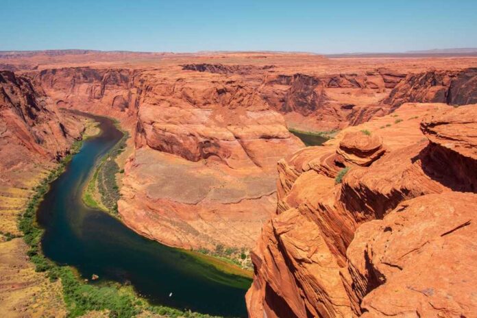 Colorado,River,On,Horseshoe,Bend,Trail,Arizona.,Landscape,Canyon,National Colorado River winding through a red rock canyon under a clear blue sky