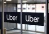 Sign showing Lyft and Uber pickup location.
