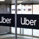Sign showing Lyft and Uber pickup location.