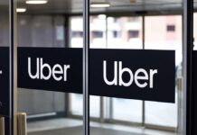 Uber’s $40M Shock Over Freeway Drop-Off Sign showing Lyft and Uber pickup location.