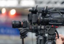 Grand Jury Fishing — or Bombshell? Professional video cameras on tripods