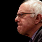 Bernie Sanders in glasses.