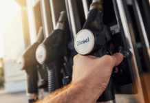 VIDEO: Drone Barrage Cripples Diesel Lifeline A hand holding a diesel fuel nozzle at a gas station