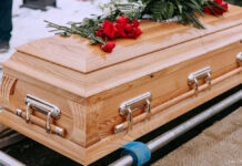 SAD NEWS: TV Star Gone Wooden casket with red roses on top