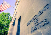 DOJ Targets Dem- Bombshell Claim Resurfaces Department of Justice building with American flag.