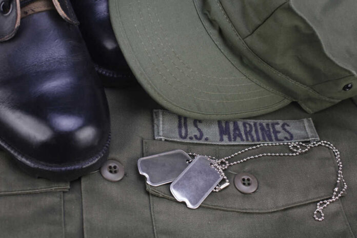 shutterstock_1630141729 US Marines uniform with boots and dog tags