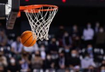 SHOCKER: College Hoops RIGGED Basketball swishing through a hoop during a game