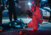 Hate-Fueled Plot Halted Before Worship Forensic investigator examines crime scene at night.