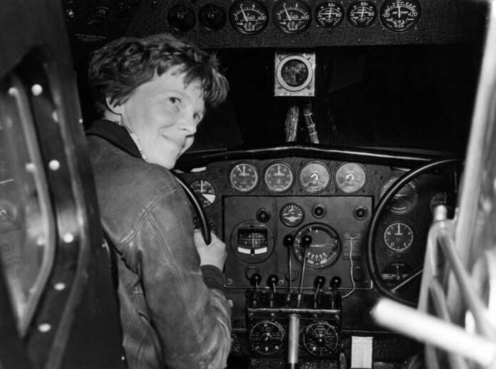 Amelia,Earhart,In,Her,Lockheed,L-,10e,Electra,Prepares,For Amelia Earhart
