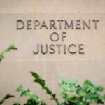 DOJ Drops Election-Crime Bombshell Department of Justice building wall with engraved lettering