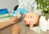 Drug That Kills Cravings Targets Cash A patient handing cash to a healthcare professional in a medical setting